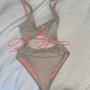 Pink and blue one-piece swimsuit